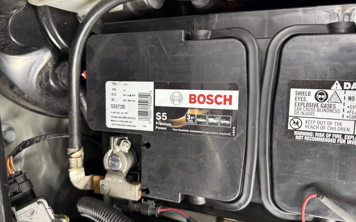 Car battery and electrical connections inspected at America Auto Repair in Doral, FL