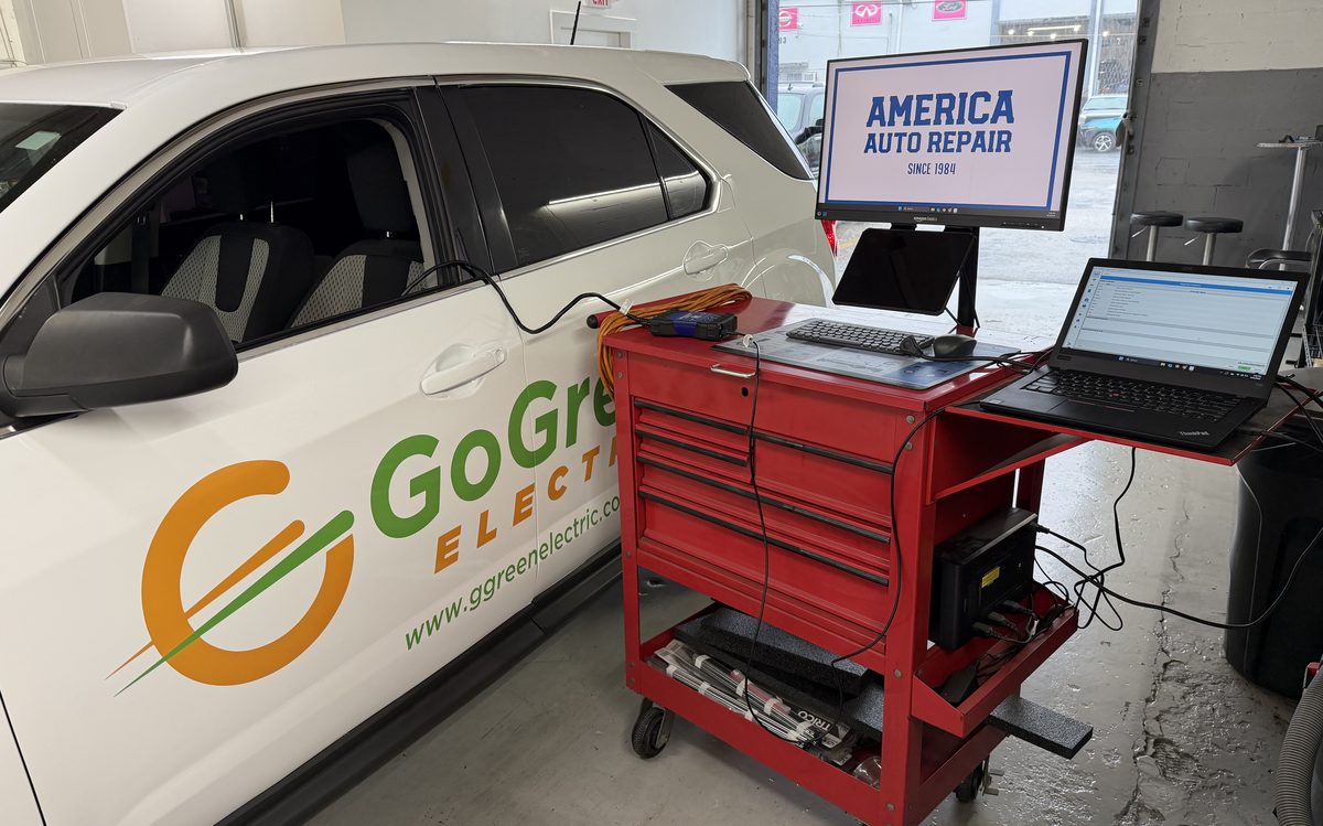 Vehicle connected to diagnostic equipment during a pre-purchase inspection at America Auto Repair in Doral, FL